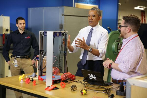 President Obama looking over the 3D printers on display at the first White House Maker Faire. Courtesy of the White House.