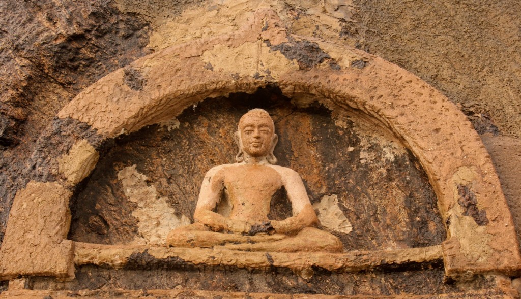 A carved representation of Buddha meditating. Courtesy of Jvsnkk.