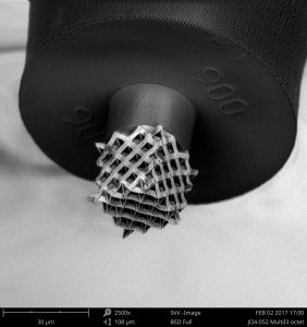 LLNL researchers have uncovered design rules for synthesizing photopolymers, optimizing the materials for custom TPL applications. Shown here are 3D-printed octet truss structures built on top of a solid base the diameter of a human hair. (Image courtesy of James Oakdale, LLNL.)